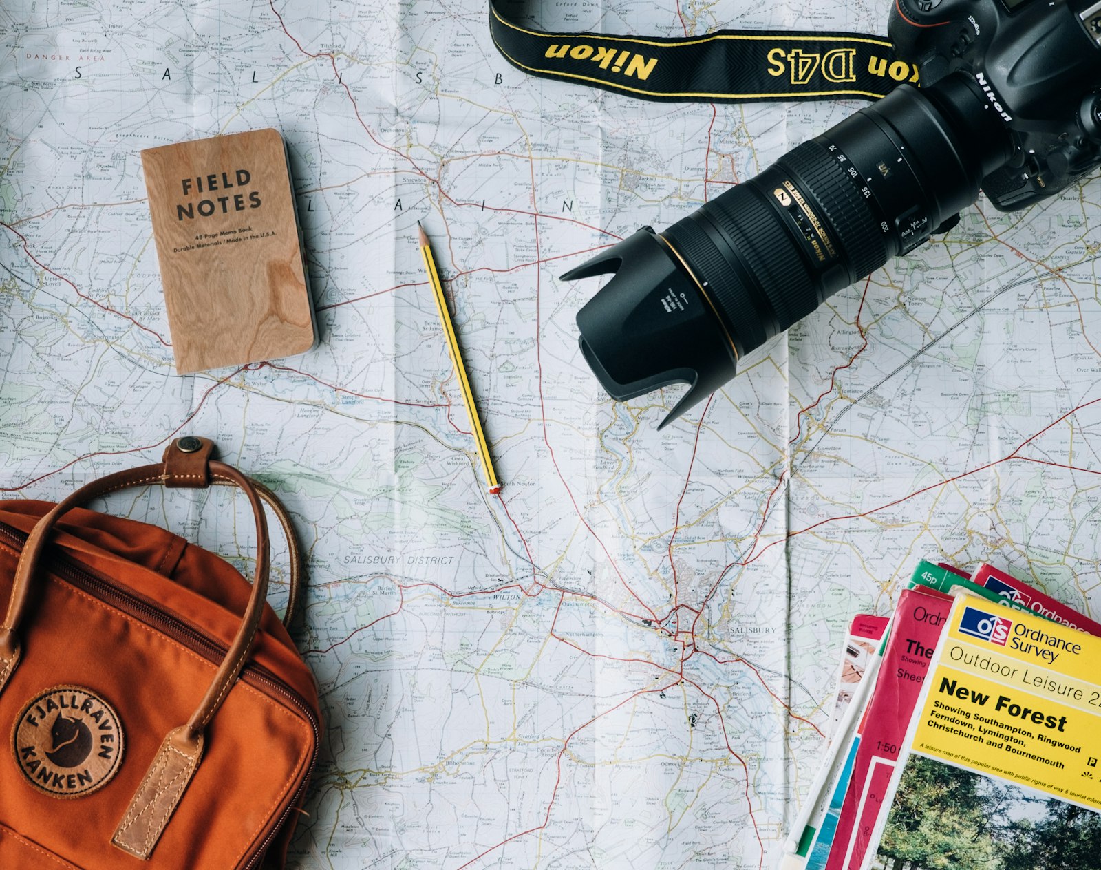 Passport and travel documents on a desk